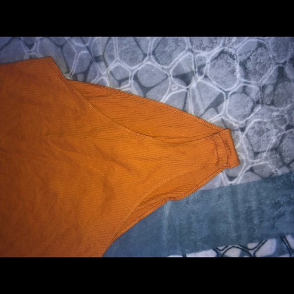 orange body suit - Picture 2 of 2
